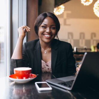 african-american-business-woman-working-cafe_1303-10862